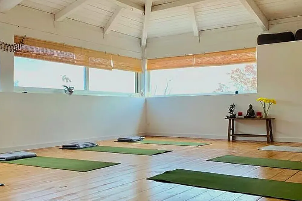 Yogapuglia — Yogapuglia is situated in the picturesque Valle d'Itria in Apulia, Southern Italy. This region is known for its tranquil landscapes, olive groves, and charming trulli houses, providing a naturally peaceful backdrop for retreat and introspection.