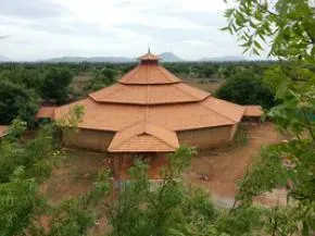 Dhamma Arunachala — The center is situated on the Arunachala Hill mountain, a site revered for millennia as an abode of sages and saints. This historical and spiritual landscape provides a potent backdrop for meditation, offering a sense of profound peace and connection to an ancient lineage of wisdom.