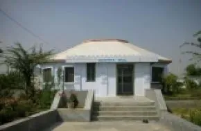 Dhamma Cakka — Dhamma Cakka is situated in the rural landscape of Village Khargipur, just outside Varanasi. Its location is particularly significant, being a short distance from the Deer Park, the site of the Buddha's first sermon. This historical and spiritual proximity imbues the area with a palpable sense of peace and reverence, surrounded by other monasteries and sacred sites that contribute to a contemplative atmosphere.