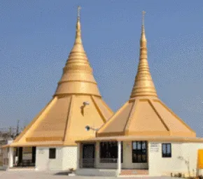 Dhamma Kalyana — Dhamma Kalyana is nestled amidst the fertile agricultural fields of Uttar Pradesh, offering a peaceful rural atmosphere. Its location directly on the banks of the famous Ganga river adds a spiritual and scenic dimension to the retreat experience. The center itself is characterized by its simple beauty, featuring flower trees and well-tended gardens that contribute to a calm and reflective environment.