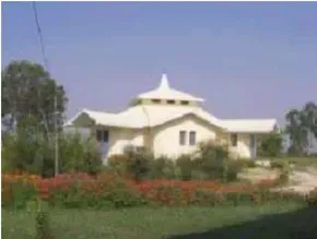 Dhamma Lakkhana — The center is set on eight acres of land, graced with several auspicious trees, including peepal, providing a naturally calming environment. It's located in Uttar Pradesh, India, offering a blend of rural tranquility and accessibility.