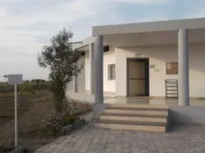 Dhamma Malwa — The center is situated in Village Jambudi Hapsi, opposite Gommatgiri, with the Pitru mountain as a backdrop, offering a peaceful and natural environment conducive to meditation. The location near Indore provides a sense of quietude away from urban bustle.