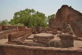 Nava Nalanda Mahavihara (Deemed to be University) — The center is beautifully situated on the bank of a tranquil lake, offering a peaceful environment for meditation. It's just a short distance, about 1 km, from the awe-inspiring Ruins of Nalanda, imbuing the location with a deep sense of history and spiritual significance.