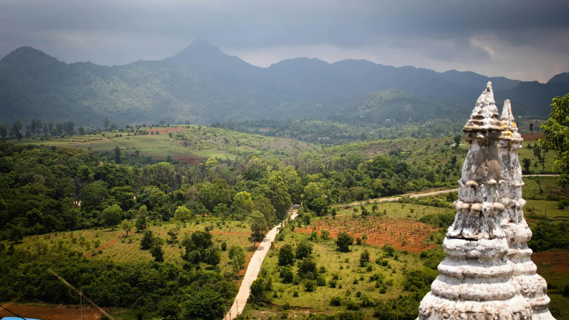 Dhamma Pabbata — The center is situated in Muse, within the Shan region of Myanmar. This location suggests a backdrop of natural beauty, likely featuring mountainous or hilly terrain characteristic of Shan State, providing a peaceful and secluded atmosphere for meditation.