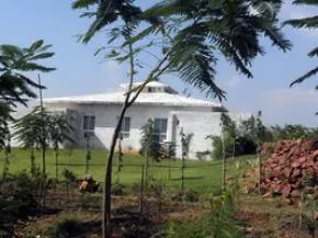 Dhamma Pala — The center is situated in Village Daulatpura, close to the Kerwa Dam, approximately 18 kilometers from Bhopal. This location provides a peaceful and natural environment conducive to meditation practice, away from the city's hustle.