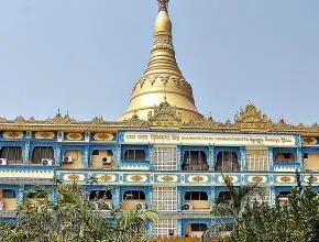 Dhamma Pattana — The center is situated on a hill, providing views of the Gorai beach town. It is part of the larger Global Vipassana Pagoda Campus, creating a distinct and expansive atmosphere that blends spiritual architecture with natural surroundings.