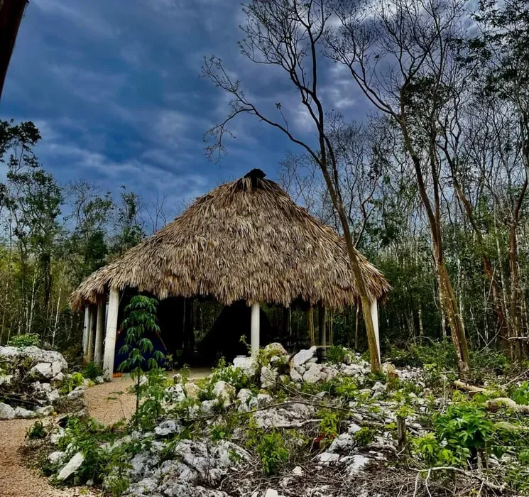 Aldea Yakunah — Aldea Yakunah is nestled deep within the Mayan jungle, providing a natural sanctuary for introspection and connection. The air is alive with the energy of the forest, creating a serene and immersive environment. Traditional palapas and eco-friendly cabins blend seamlessly with the surroundings, inviting guests to truly disconnect from the outside world and embrace the rhythms of nature.
