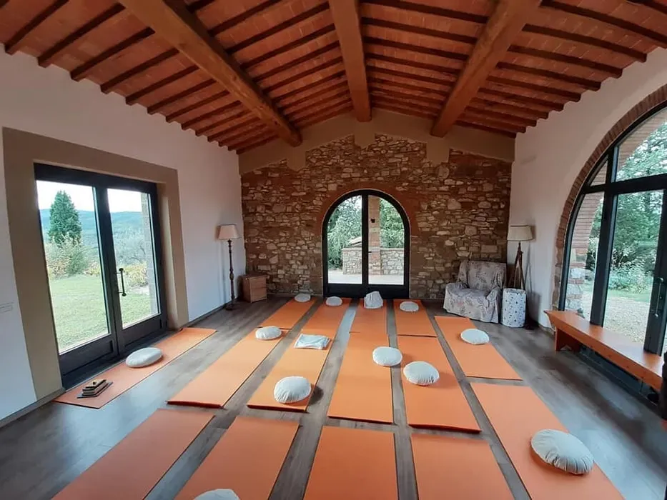 Alkali Yogi Wellness — Alkali Yogi Wellness is situated within the picturesque Ancora del Chianti B&B, nestled amidst the beautiful rolling vineyards and olive groves of the Chianti region. The fertile land provides an abundant and nurturing environment, contributing to the farm-to-table dining experience. It's a serene and inspiring backdrop for a wellness journey, offering classic Tuscan charm.