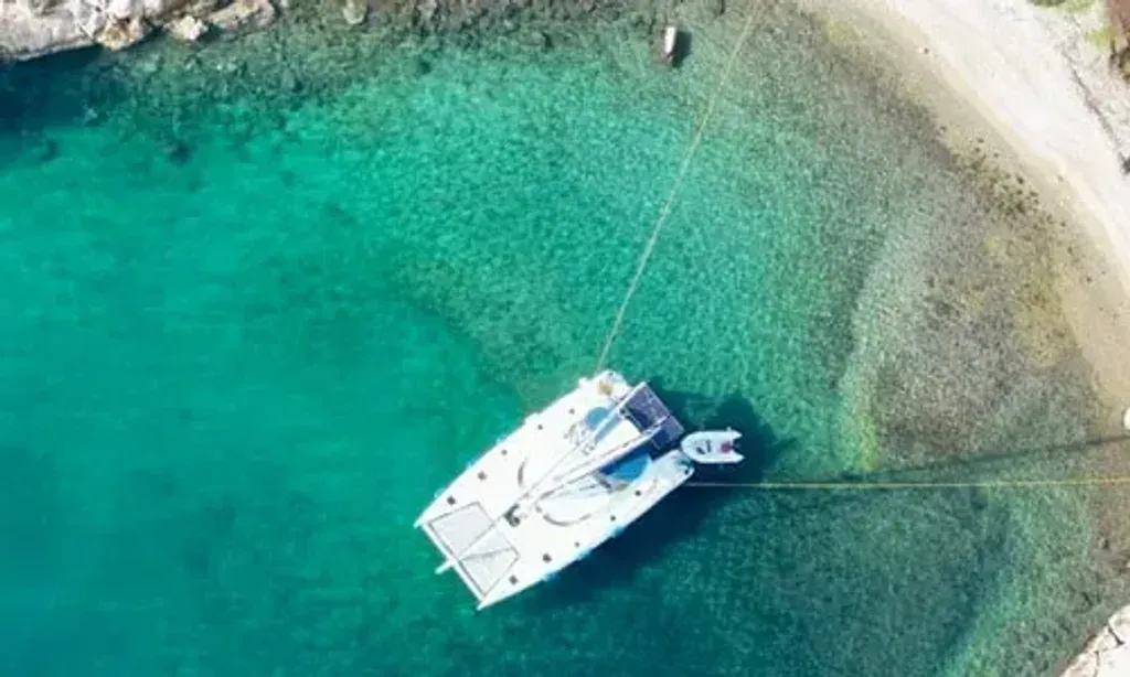 Body, Mind, & Sail — This retreat takes place on a sailing vessel, offering a dynamic and intimate connection with the Greek seas. The atmosphere is one of shared joy and mindful living, with the ever-changing seascape providing a natural backdrop for introspection and rejuvenation.