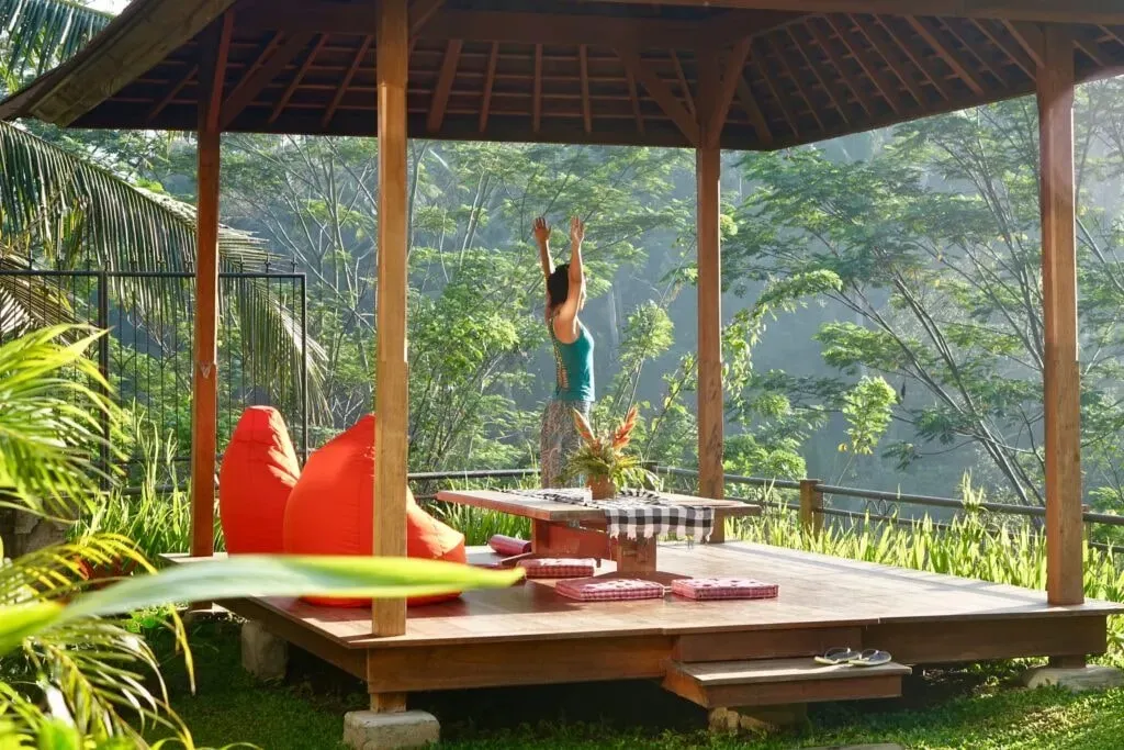 Breath and Love Retreats — Villa Selat, located in Gianyar, Bali, offers a tranquil and naturally beautiful environment. Surrounded by the island's characteristic lush greenery, the setting provides a peaceful backdrop conducive to introspection and healing. The atmosphere is one of serene escape, allowing guests to fully immerse themselves in their retreat experience away from daily distractions.