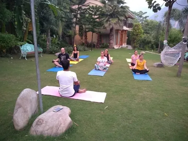 Call Of Rishikesh — set in the peaceful Himalayan foothills of Rishikesh, the center offers a tranquil environment conducive to spiritual practice and self-reflection. The natural beauty of the region provides a calming backdrop for your retreat.