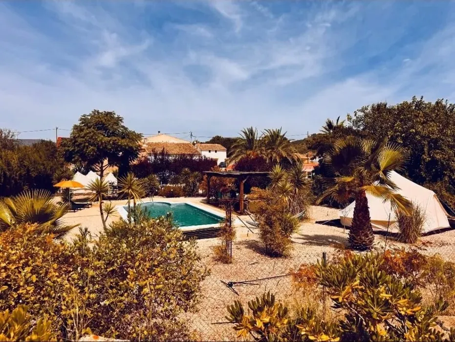 Casa Creation — Casa Creation is situated in the tranquil Spanish countryside, offering a serene escape. The property features a lush garden, a swimming pool, and numerous inviting nooks for quiet contemplation or social interaction. The natural surroundings provide a calming backdrop for personal reflection and healing.