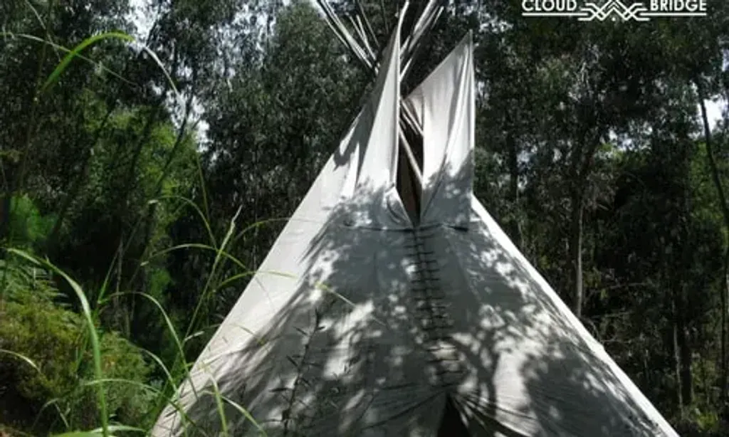 Cloud Bridge — Cloud Bridge is situated in the serene natural environment of Monchique, Portugal. The location encourages a deep immersion in nature, providing a peaceful backdrop for introspection and creative expression. The atmosphere is designed to help guests disconnect from urban influences and reconnect with their inherent nature.