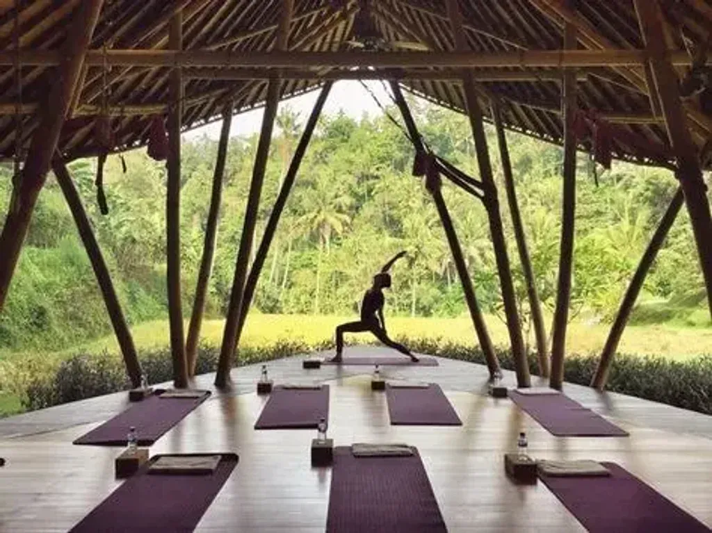 Conscious Travel Club — This unique offering takes you across three distinct Balinese locales: the vibrant surf town of Canggu, the spiritual heartland of Ubud, and the stunning cliffside beauty of Uluwatu. You'll experience a variety of atmospheres as you move between different hotels, each chosen to enhance your journey through Bali's diverse landscapes and cultural richness.