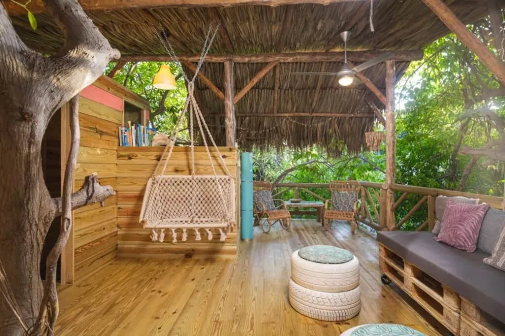 Deborah — Mondi Lodge is an eco-friendly tropical sanctuary set in Willemstad, Curacao. The grounds are designed to immerse guests in nature, with lush gardens filled with vibrant flowers and local fauna. The atmosphere is serene and peaceful, offering a quiet escape where the sounds of singing birds greet you each morning.