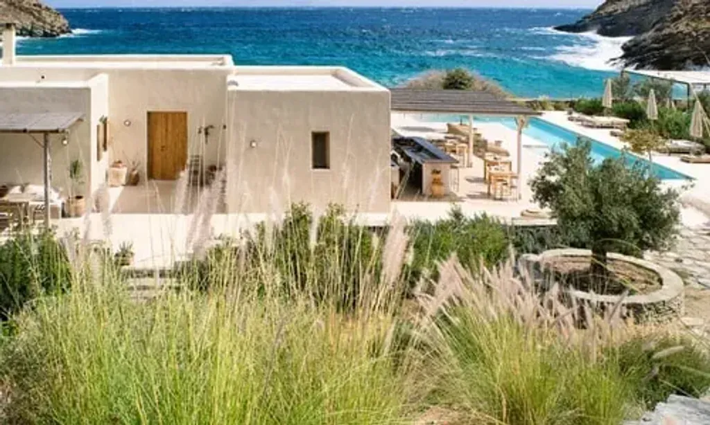 Deia health — Deia Health is set on the Greek island of Kea, specifically in Psathi Bay. Guests stay in thoughtfully renovated ancient Aegean farmhouses, set against the backdrop of a mesmerizing secluded bay. The natural environment plays a central role, with outdoor dining and a beachfront yoga shala where classes are accompanied by the soothing sound of the waves.
