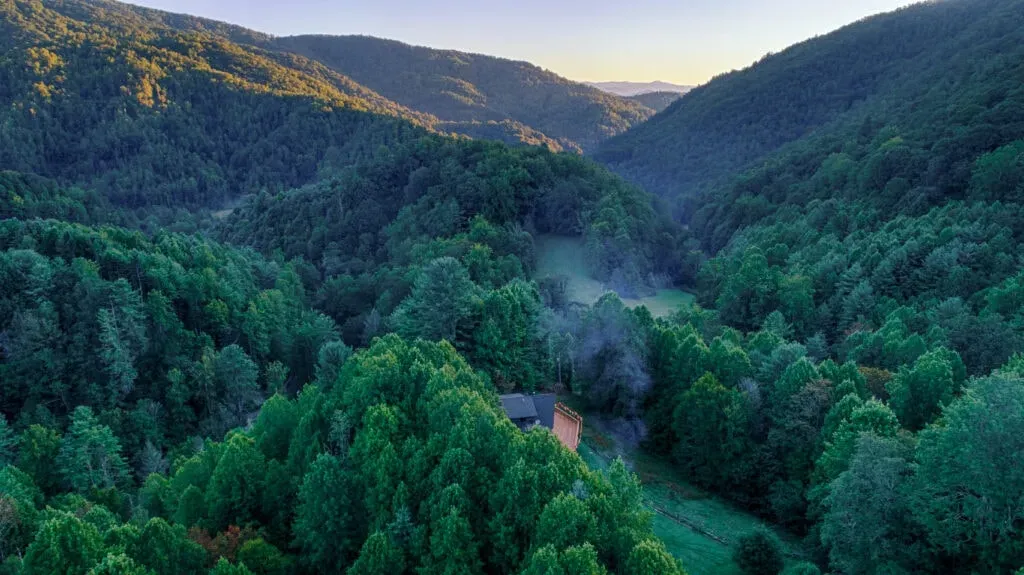 Divine Nectar Botanicals — The Wheel of Bliss Retreat Center is a secluded 63-acre forest sanctuary in the heart of the Blue Ridge Mountains of Southern Appalachia, about an hour from Asheville, North Carolina. The landscape offers a serene and natural backdrop for deep introspection and connection with the Earth.