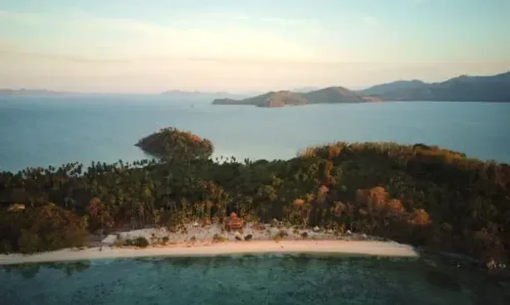 DRYFT — DRYFT is situated on the isolated Darocotan Island in Palawan, offering a serene and natural environment. The venue itself blends into this landscape with its unique, sustainably built structures, providing a tribal-inspired atmosphere that encourages a deep connection with the island's natural beauty.