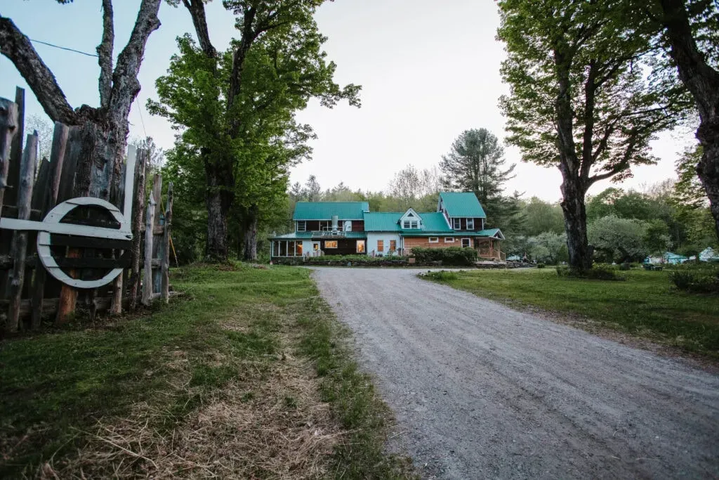 Earthdance Creative Living — set on 125 acres of wooded land, Earthdance features two small streams, creating a vivid and serene landscape for guests to explore and camp. The main facility is a charming 1812 farmhouse, thoroughly renovated and adorned with handcrafted stained glass, tiles, and wall art, giving it a unique, artful character.