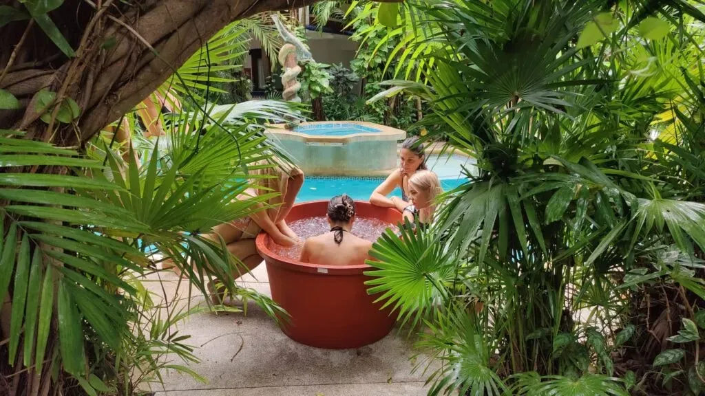 Evolution Wellness Retreat — The retreat is set in a luxurious and serene location in Cancún, surrounded by lush trees, creating a tranquil oasis. Its proximity to the airport makes it easily accessible, while still offering a peaceful escape. After your retreat, the vibrant Caribbean paradise awaits, with options to explore jungle cenotes or ancient Mayan heritage sites.