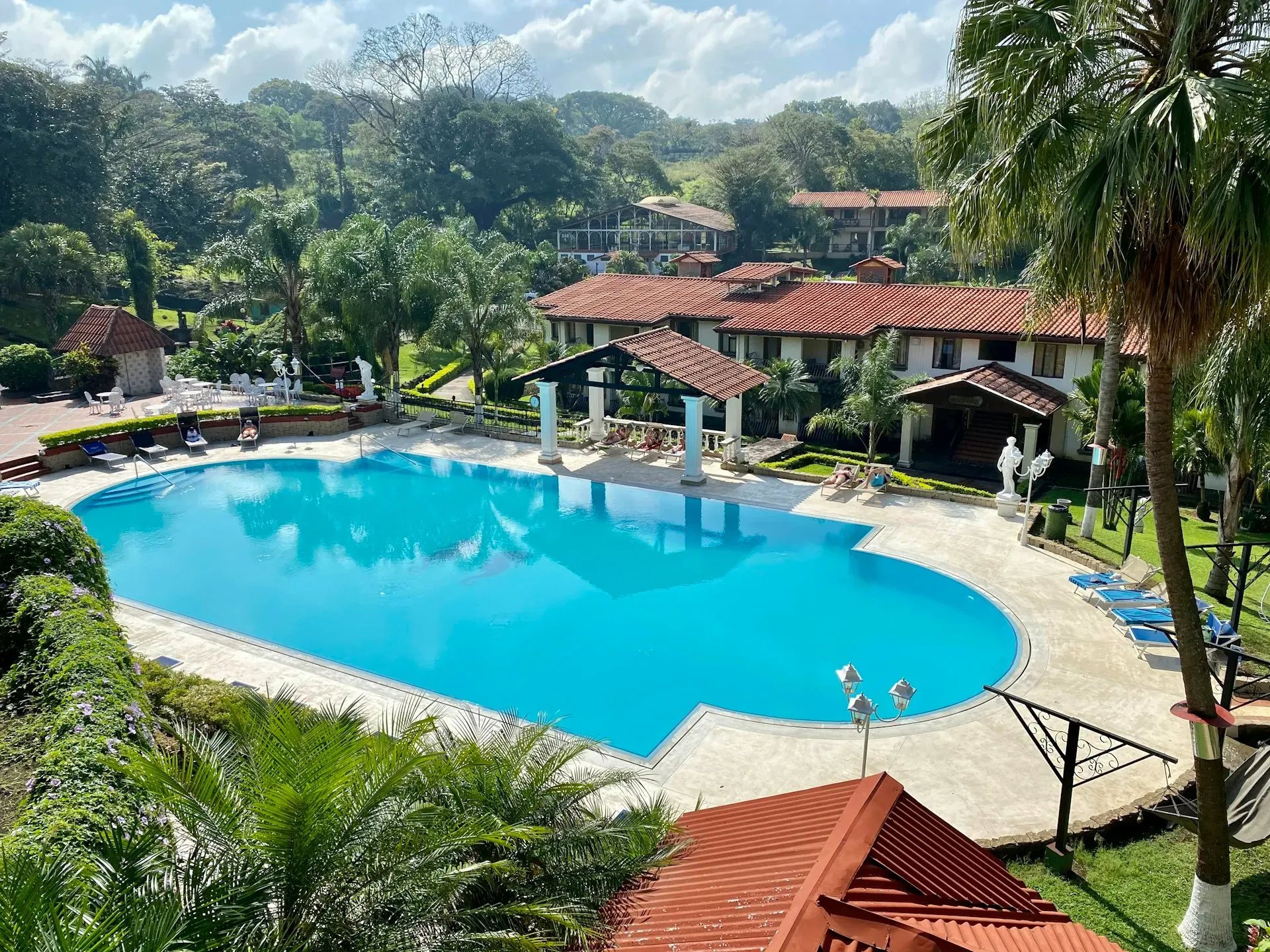 Finca Malama — Finca Malama is situated in a beautiful, secluded natural environment in Alajuela. The property boasts extensive acreage where much of its food, including coffee beans, is grown, offering guests a direct connection to the land and its bounty. The atmosphere is quiet and serene, fostering a sense of peace and relaxation.
