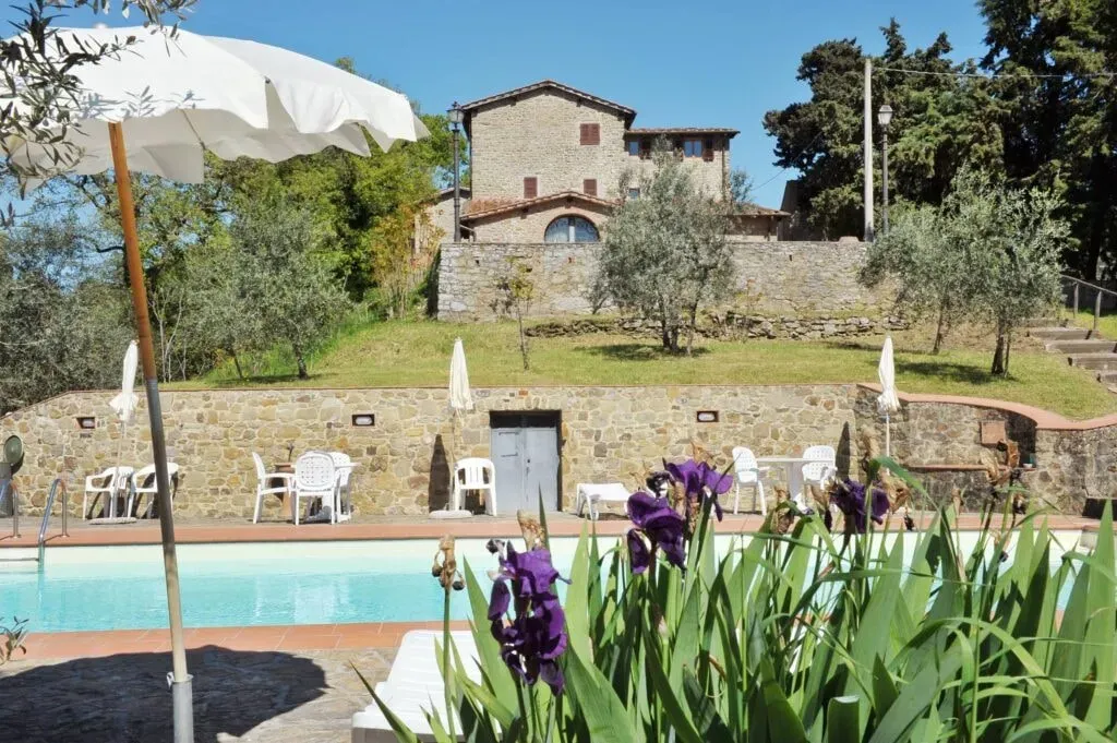 Firenze — This historic 14th-century agriturismo is set within 33 hectares of lush olive groves, vineyards, and forests. The landscape provides a serene backdrop for contemplation and relaxation, with natural terraces well suited to yoga and meditation, and a swimming pool set among the olive trees.