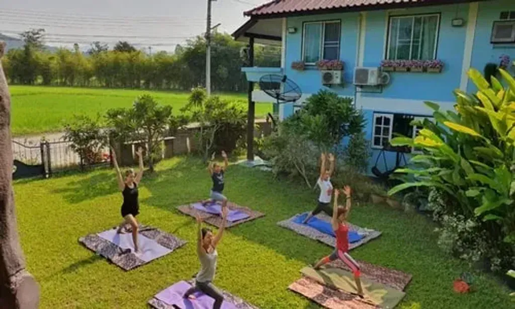 Flow Yoga Chiang Mai — Located in the serene countryside just beyond Chiang Mai, the center offers a peaceful environment away from urban bustle. The surrounding area is characterized by lush greenery and a calm atmosphere, providing an ideal backdrop for contemplative practices.