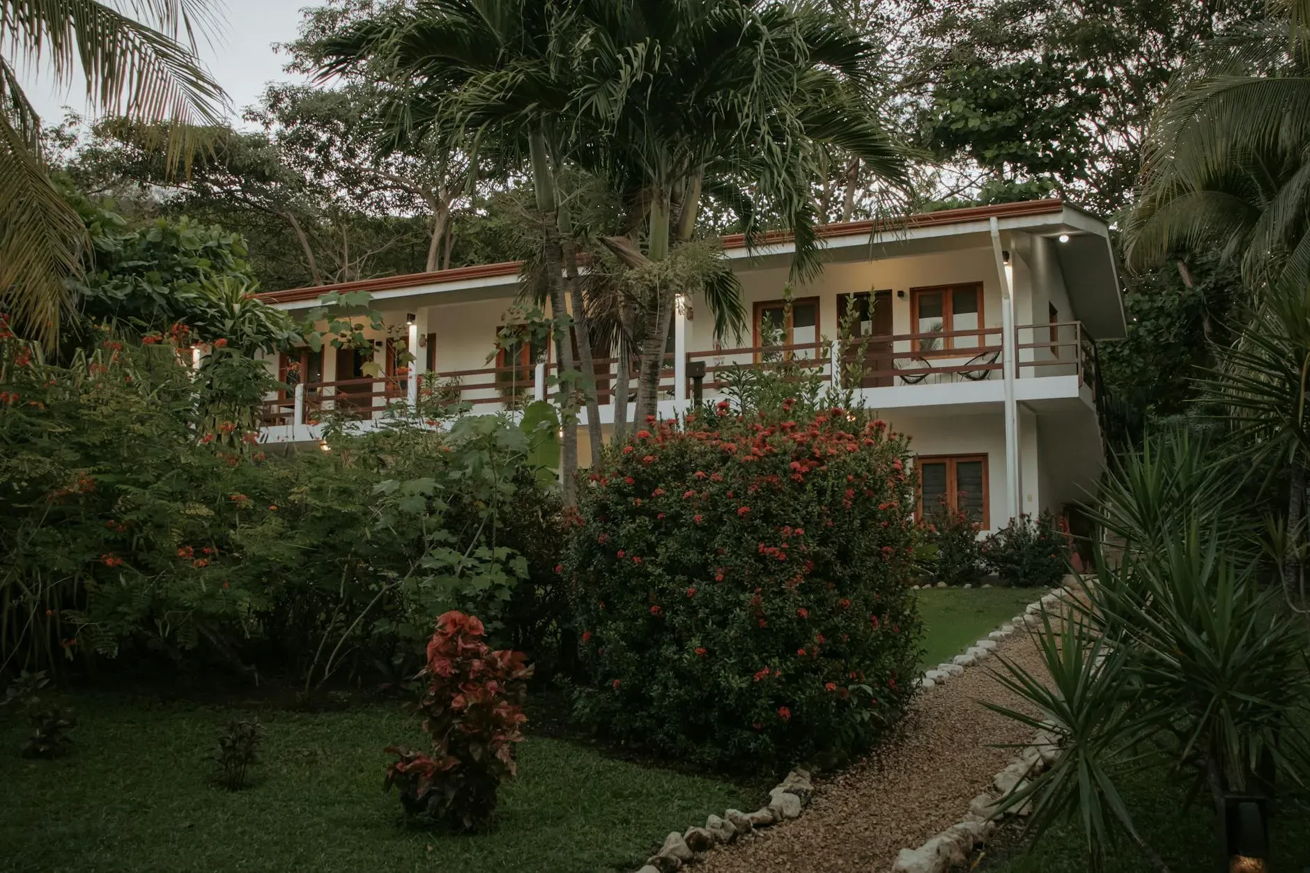 Grant Ifflander Yoga — The Sanctuary at Two Rivers is an off-grid haven set within the lush, tropical jungle of Costa Rica. Surrounded by vibrant flora and fauna, the atmosphere is one of serene seclusion, offering a deep connection to nature. The sound of the jungle provides a constant, calming backdrop to the retreat experience.