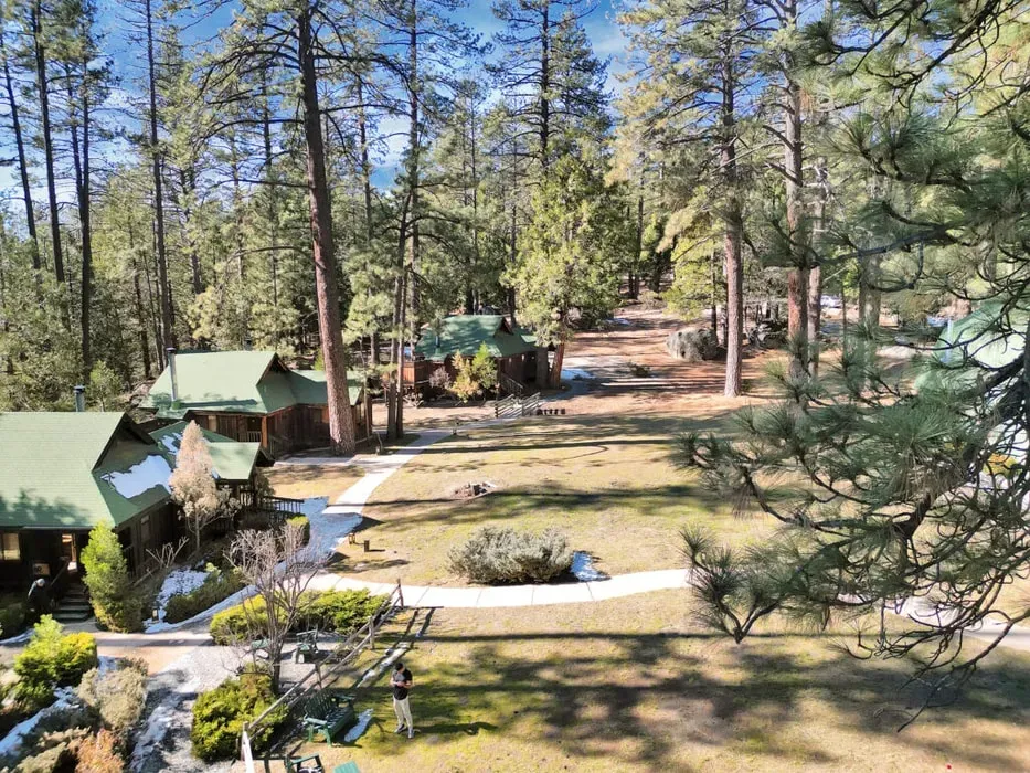 Gravett Retreats — set in the beautiful San Jacinto Mountains of Southern California, Gravett Retreats is surrounded by a dense forest of tall pine and cedar trees. The location offers a profound sense of being miles away from urban life, providing a peaceful and natural backdrop for relaxation and introspection.