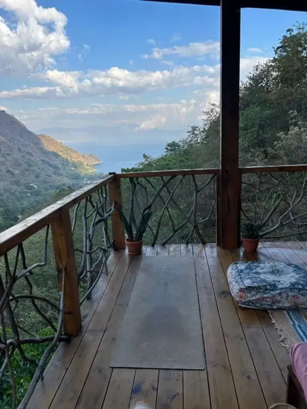 Gypsyinthewild — The retreat is set in an unknown location, though morning yoga sessions offer views of the Tzununa valley and Lake Atitlan. This suggests a mountainous, scenic environment, likely offering tranquility and natural beauty.