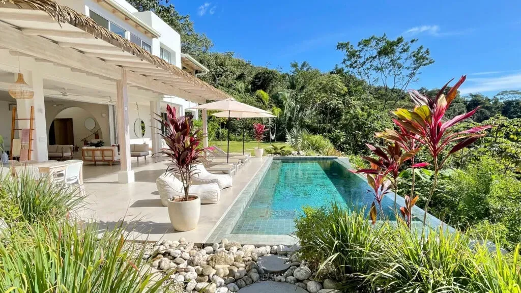 Hana Hein Coaching & Yoga Co — The retreat is set in a boutique villa built into a cliff in Samara, Costa Rica. The design intentionally highlights the natural beauty of the surroundings, from the morning mist to the sunset over the ocean. The interiors are subtly decorated to draw attention to the expansive ocean views, creating a serene and natural atmosphere.