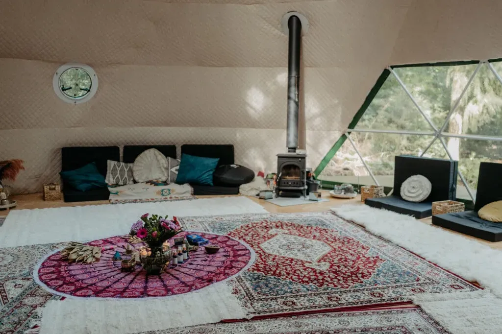 Heal2Feel by Christina — The center is situated in a serene forest in Großenkneten, providing a peaceful and natural environment. The plant medicine ceremonies are held within a distinctive dome tent, offering an intimate and immersive experience surrounded by nature.