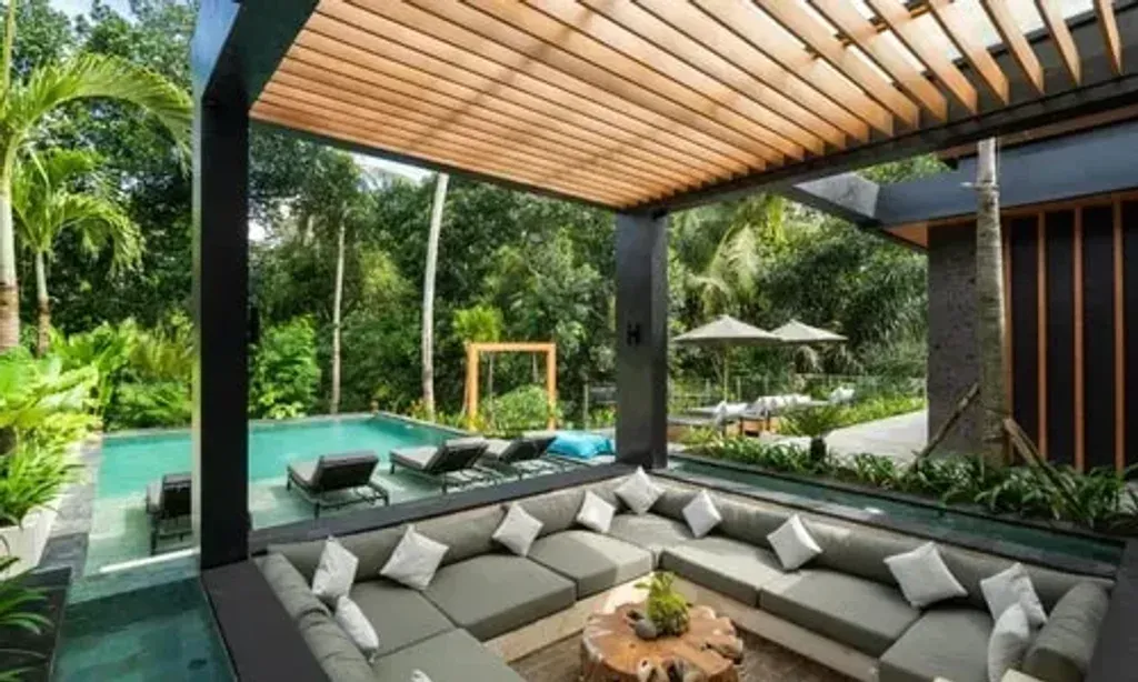 Heart n Sole Journeys Pte Ltd — Villa Kia Ora is set in the verdant, spiritual heartland of Ubud, Bali. The atmosphere is one of serene natural beauty, with contemporary comforts harmoniously integrated into the lush tropical surroundings, providing a peaceful escape.