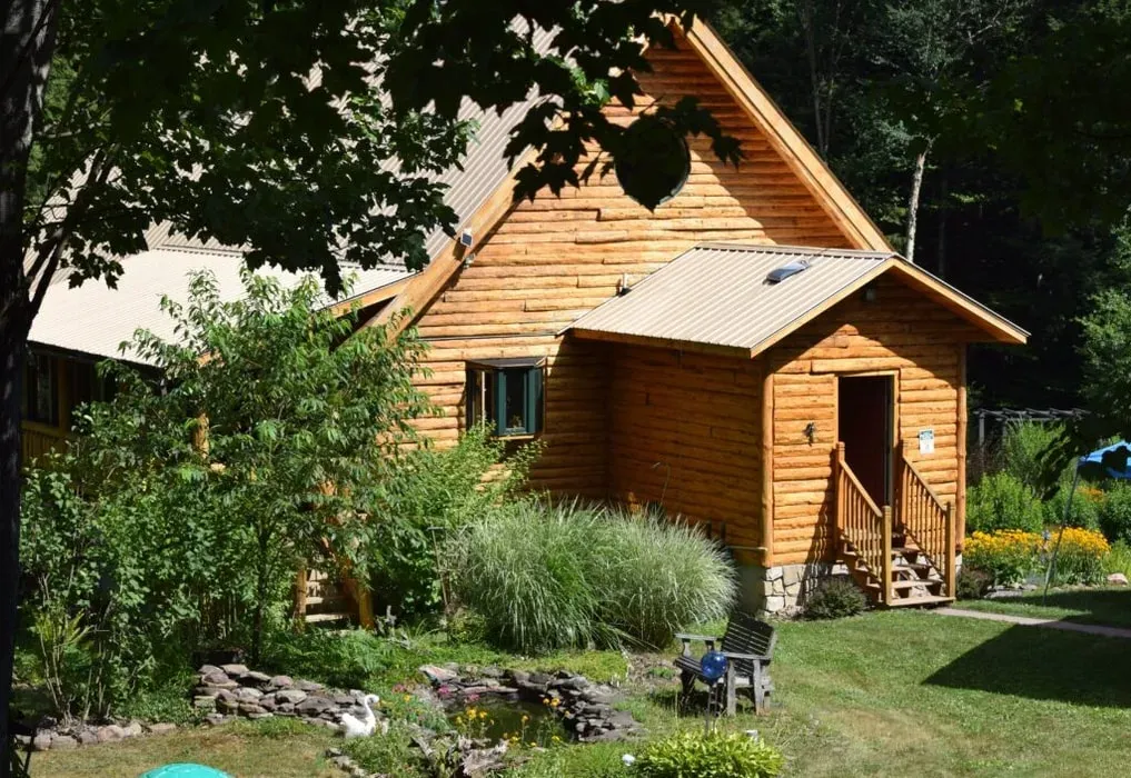 Holistic Horizons at Fiddlehead Grove Retreat — Set at the foothills of the Adirondack Mountains in Central New York, the retreat is surrounded by nature, offering a tranquil environment that flourishes throughout all seasons. It provides a sanctuary for rest and rejuvenation, with ample outdoor space to connect with the natural world.