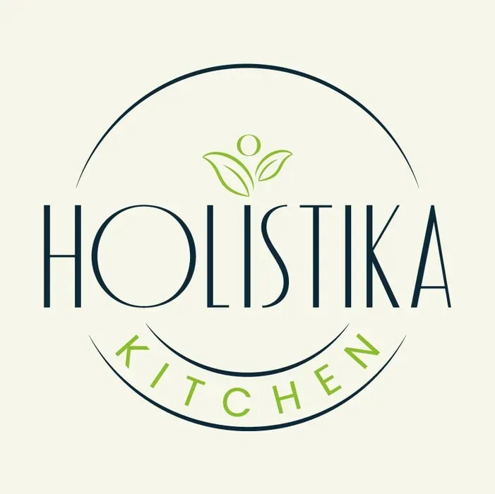 Holistika Kitchen — The retreat is situated on expansive, peaceful land, providing a nature-based environment ideal for quiet contemplation and nervous system regulation. The atmosphere is intentionally calm and grounded, fostering a sense of deep relaxation and integration with the natural surroundings. Communal areas are spacious and warm, designed to encourage both individual reflection and comfortable gathering.