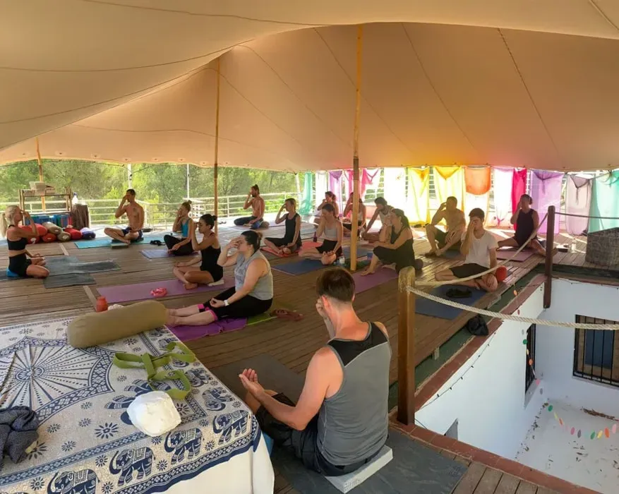 Ibiza Yoga Limited — set in the serene landscape of Sant Joan de Labritja, the center offers a peaceful escape. The charming Ibiza-style villa is surrounded by nature, providing a tranquil backdrop for practice and relaxation. Guests can unwind in the garden with deck chairs, enjoying the island's natural beauty.