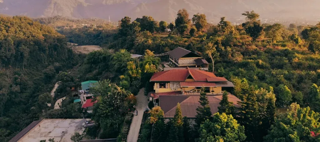 Igniting Spark — The Tree of Life venue is set in the peaceful Dehradun Foothills, surrounded by lush greenery, gentle breezes, and the sounds of nature. This environment naturally invites a sense of stillness and calm, making it an ideal place for quiet contemplation and rest.