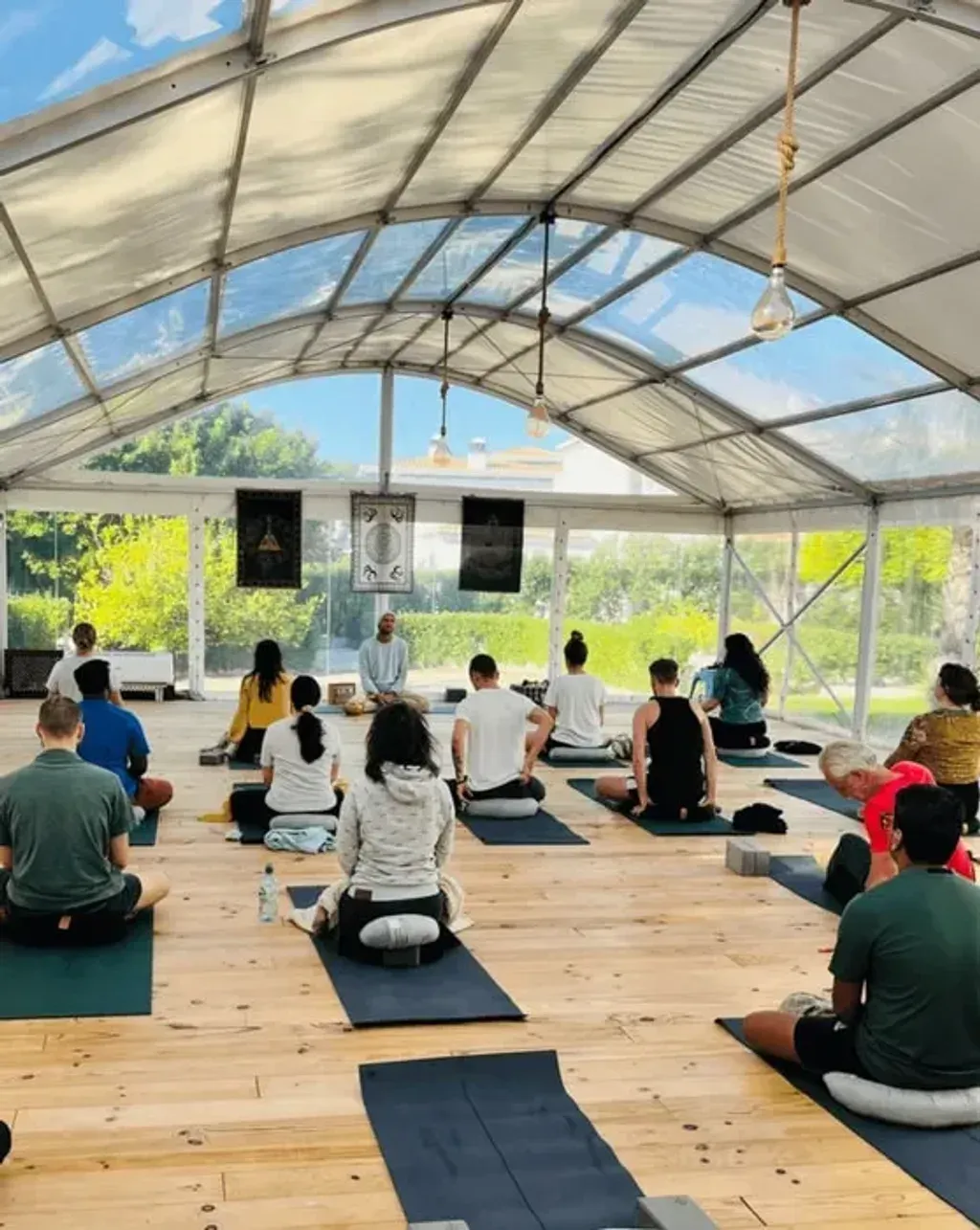 Innate — The center is situated on a beautiful campus in Portugal, close to the renowned surf beach of Peniche. The environment is designed for both relaxation and productivity, with modern villas clustered around various amenities, providing a balanced atmosphere of community and personal space.