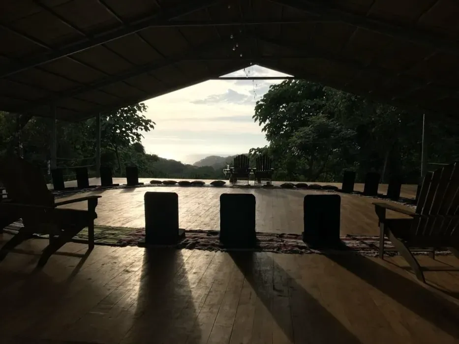 Inner Alchemy Retreats — Perched on a hill overlooking the Pacific, Inner Alchemy Retreats is situated within the expansive 50-acre Rayos del Sol property. This location beautifully blends wild jungle with manicured tropical gardens, providing a serene and inspiring environment. The panoramic ocean views and refreshing breezes create an ideal atmosphere for deep introspection and connection with nature, just a short distance from the famous Ostional black sand beaches.