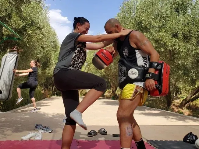 Koom Martial Arts Retreat Center Marrakech — The center is situated on a sprawling two-acre family olive farm, providing a serene and natural environment for training and relaxation. The setting offers a peaceful escape from the bustling city, surrounded by the rustic charm of the Moroccan countryside.