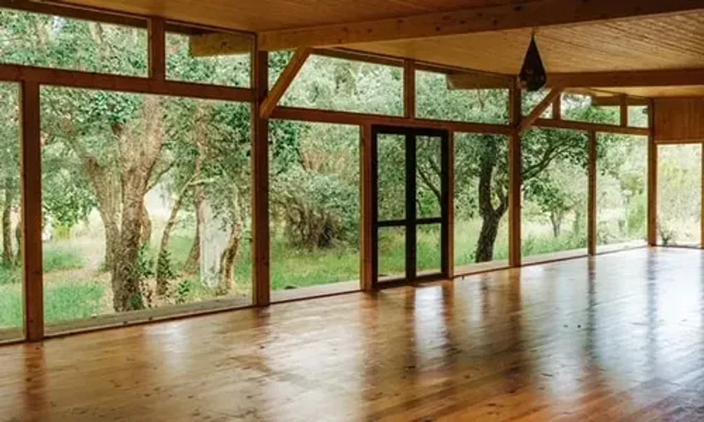Loloma Retreats — The retreat unfolds at Essencia Nature Retreat in Aljezur, a location surrounded by natural beauty. The venue features a large shala for group activities and a refreshing natural swimming pool, creating a serene and inspiring backdrop for self-exploration and connection.