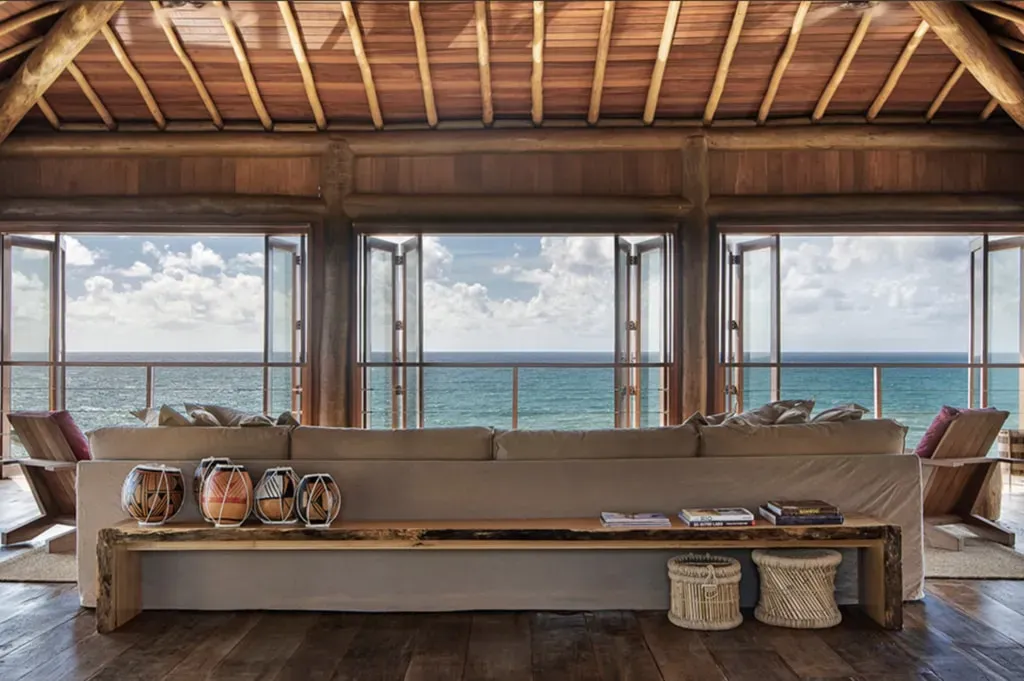 lotus retreat — Perched between lush jungle and the vast Atlantic, the villas offer an unparalleled oceanfront experience. The atmosphere is one of serene elegance, where the sounds of the waves and the vibrant natural surroundings create a perfect backdrop for introspection and renewal.