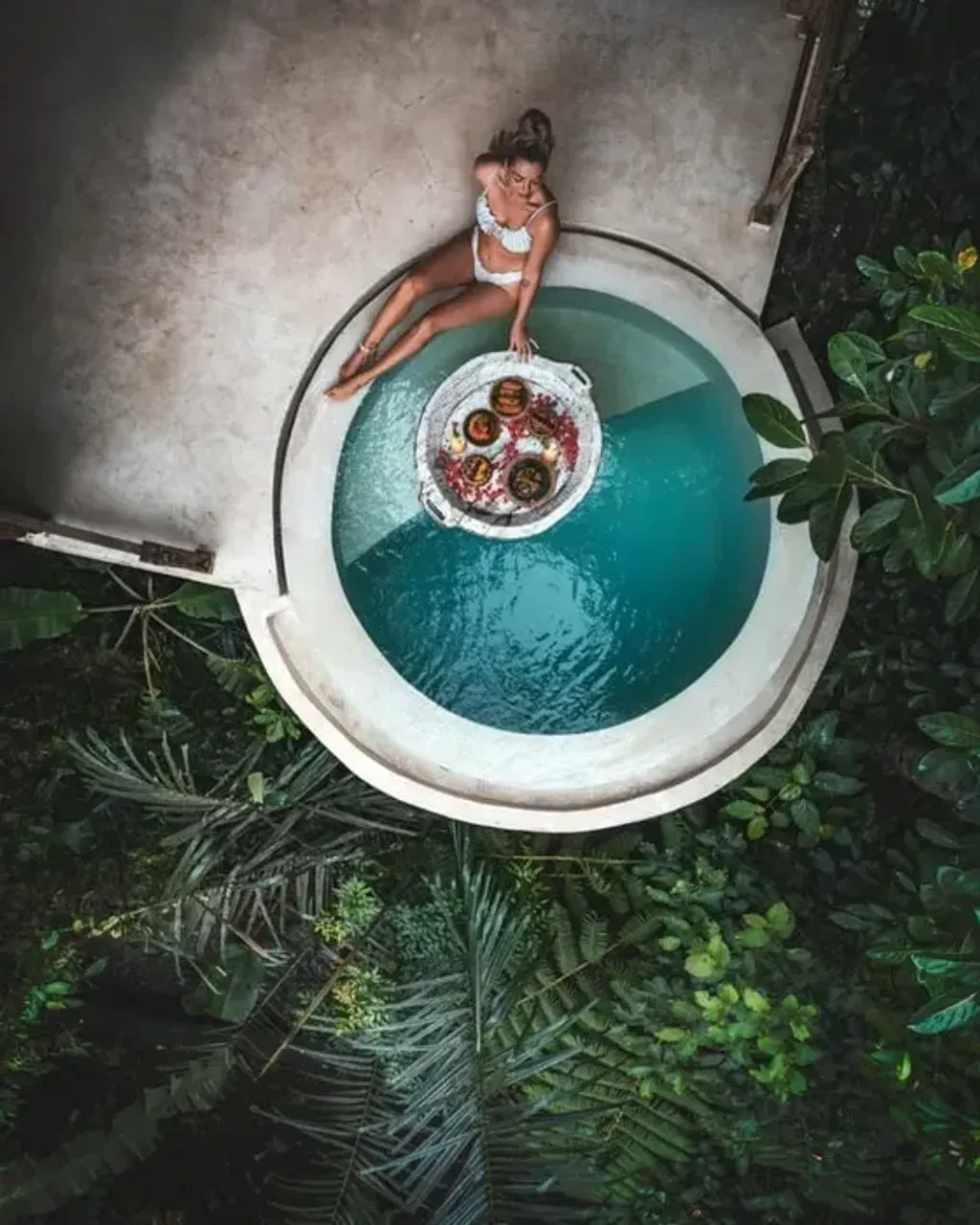 LuxWellRetreat — Perched amidst Bali's tranquil landscape, the retreat offers stunning views and a peaceful, private escape. The surroundings are designed for relaxation and rejuvenation, with lush gardens and dedicated spaces for yoga, allowing guests to connect with the island's natural beauty.