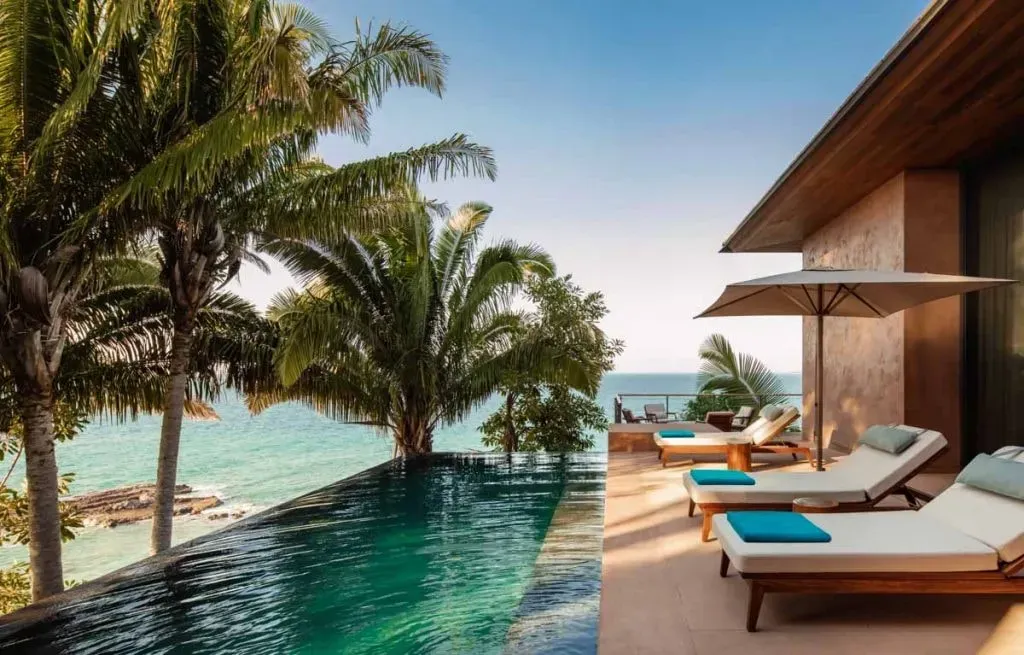 Magalie Singh – Ataméa Exclusive Retreats — Ataméa's sanctuaries are set in breathtaking landscapes, designed for intimacy and absolute exclusivity. Imagine refined suites, infinity pools overlooking stunning vistas, and hidden beaches providing a serene backdrop for renewal. Each location is chosen to enhance the meaningful journey, offering a bespoke luxury experience.