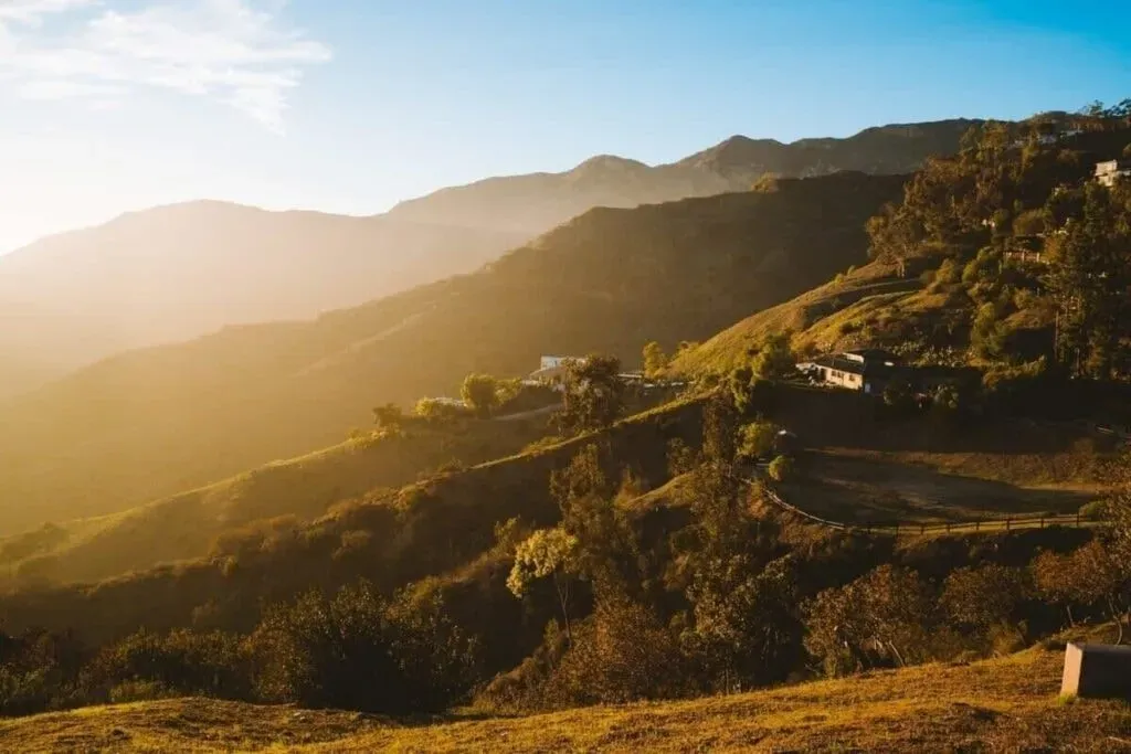 Malibu for the Mind — Perched on 15 acres, this Malibu retreat boasts expansive indoor and outdoor spaces. Guests can enjoy unobstructed ocean and sunset views, a ranch complete with swings, hammocks, and resident animals, all within a tranquil, natural environment.