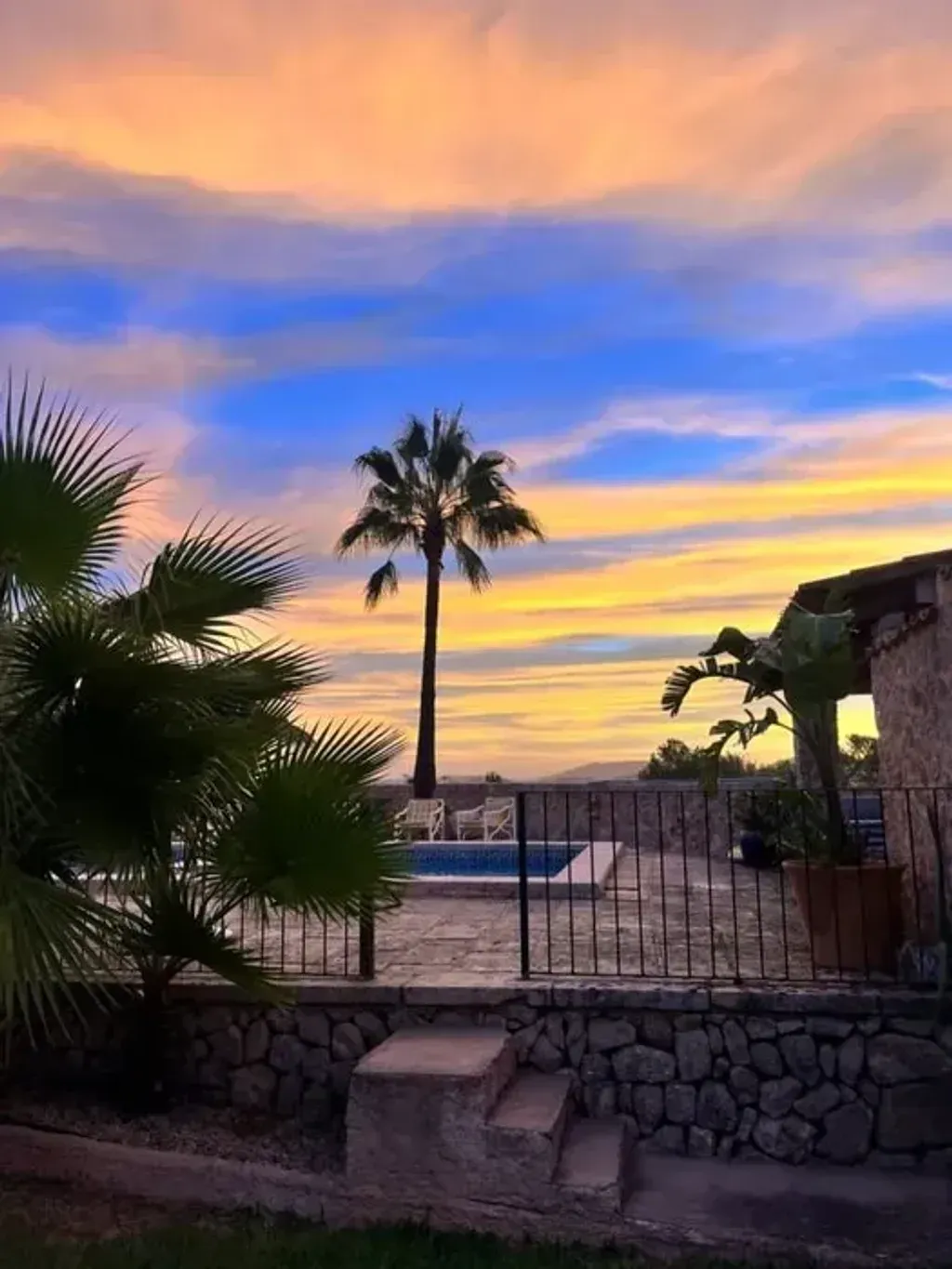 Mallorca Yoga Retreat — The retreat is set on Finca S’Almudaina, a special place quietly located and surrounded by nature. The atmosphere is warm, peaceful, and clear, with vastness, tranquility, and Mediterranean light all around. Guests can enjoy a pool, sauna, and cozy spaces designed for deep relaxation.