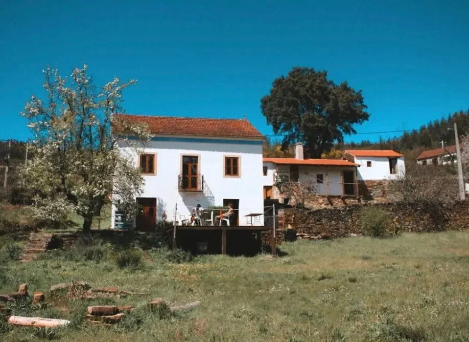 MARADENTRO — set among trees in Central Portugal, MARADENTRO offers a calm and cozy retreat house. The lush green surroundings provide ample opportunity to connect deeply with nature, complemented by indoor fireplaces for warmth and an outdoor fire pit for gathering.