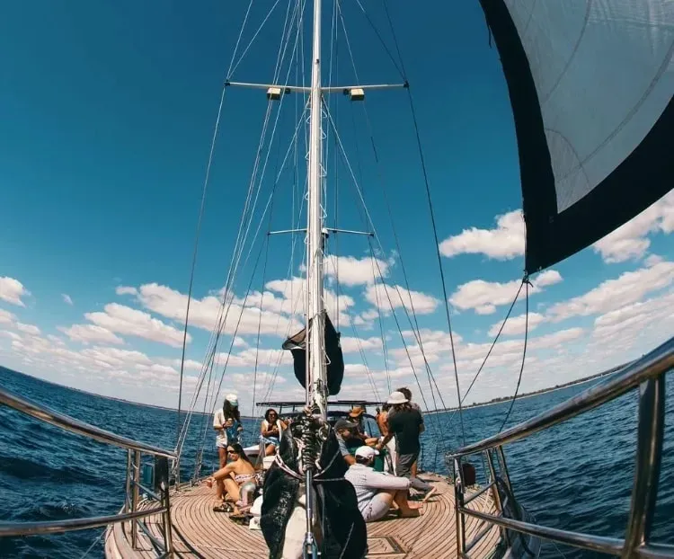 Marion McRae — These retreats unfold entirely at sea, departing from Port Geographe Marina in Busselton, Western Australia. The elegant 65-foot ketch, Starsand, provides a unique and moving sanctuary. Guests are surrounded by the vast turquoise waters and refreshing ocean air, creating an immersive natural environment for healing and reconnection.