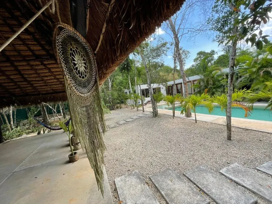 Melissa — set in the vibrant landscape of Tulum, Mexico, Villa del Encanto provides a tranquil and inspiring backdrop for spiritual work. The property boasts a lush garden, inviting swimming pool, and dedicated ceremony space, all designed to foster relaxation and introspection amidst the natural beauty of the region.