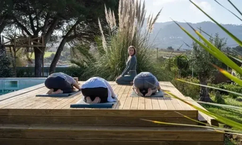 MonkeyMindRetreats — The retreat is situated on Monte da Japonica, a picturesque 120-hectare estate in Portugal's Alentejo region. Guests are surrounded by tranquil olive groves and a cork forest, providing a natural and peaceful environment for recovery and relaxation.